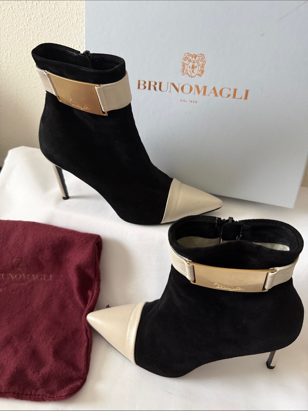 Bruno Magli Black Suede and Cream Leather Pointed Ankle Booties with Gold Plaque